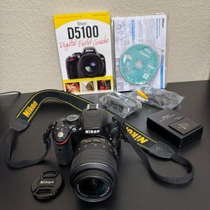 Nikon D5100 DSLR 18-55 VR Kit camera, lens, and accessories.